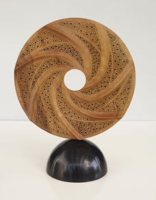 Standing disc - turned,  carved and drilled