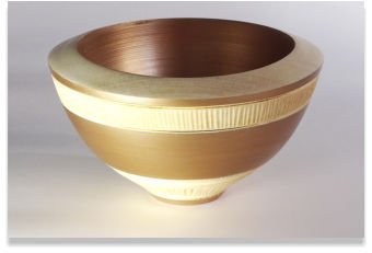 Turned wooden bowl painted with metallic acrylics